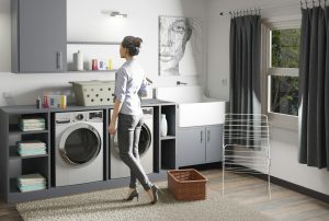A home laundry room with a washer and dryer side by side